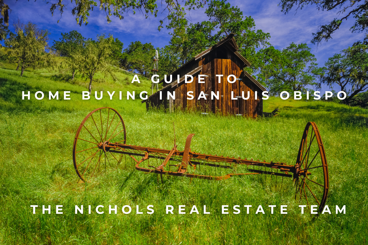 For Sale in San Luis Obispo Blog Art A photo of a rustic barn, with a horse carriage frame set in front, surrounded by a vibrant green grassy field. This photo represents the diverse San Luis Obispo County area and home buying market.